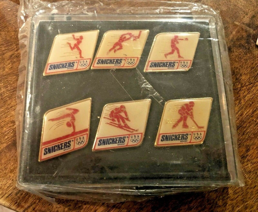 1992 Snickers Official Sponsor Winter Olympics 6 pc Pin Set Never Opened