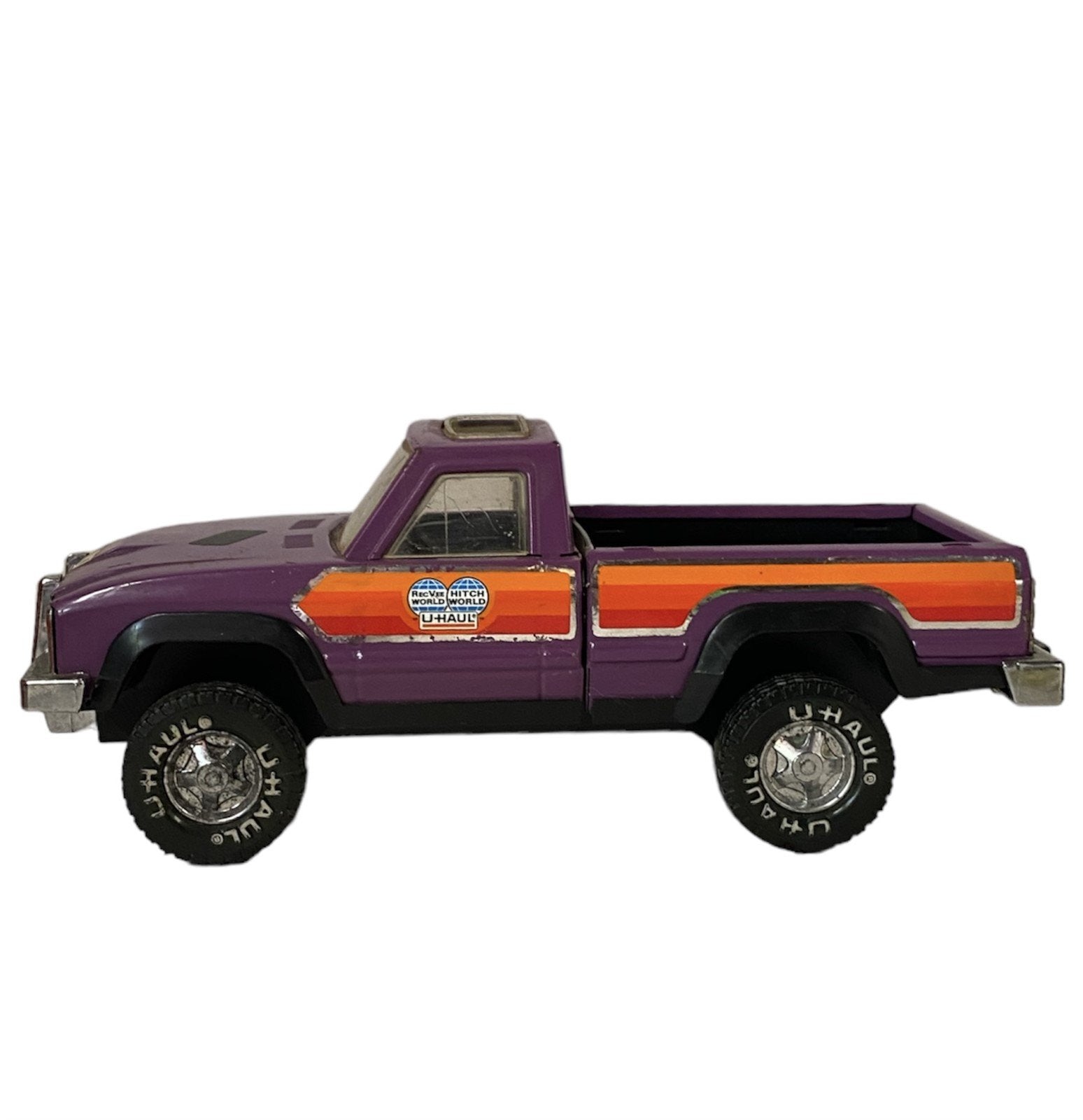 Uhual Two Purple and Black Trucks and Brown Nylint Horse Ranch Truck