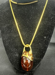 Vintage Baltic Amber Egg Shaped Pendant With Gold Plated Loop/Base