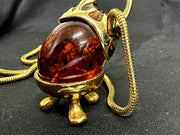 Vintage Baltic Amber Egg Shaped Pendant With Gold Plated Loop/Base