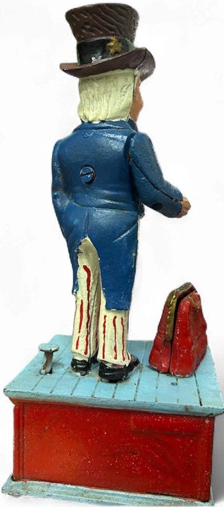 Uncle Sam vintage mechanical cast iron coin bank - working