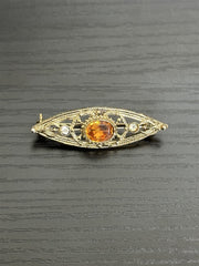 Unsigned 10k Gold-Filled Mid-Century Art Deco Filigree Brooch with Backed Oval Amber