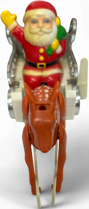 Vintage wind-up Santa Claus in a sleigh pulled by a reindeer Everlast Toys