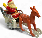 Vintage wind-up Santa Claus in a sleigh pulled by a reindeer Everlast Toys