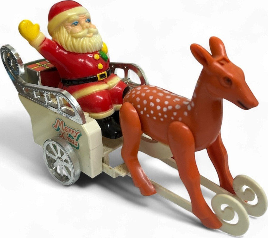 Vintage wind-up Santa Claus in a sleigh pulled by a reindeer Everlast Toys