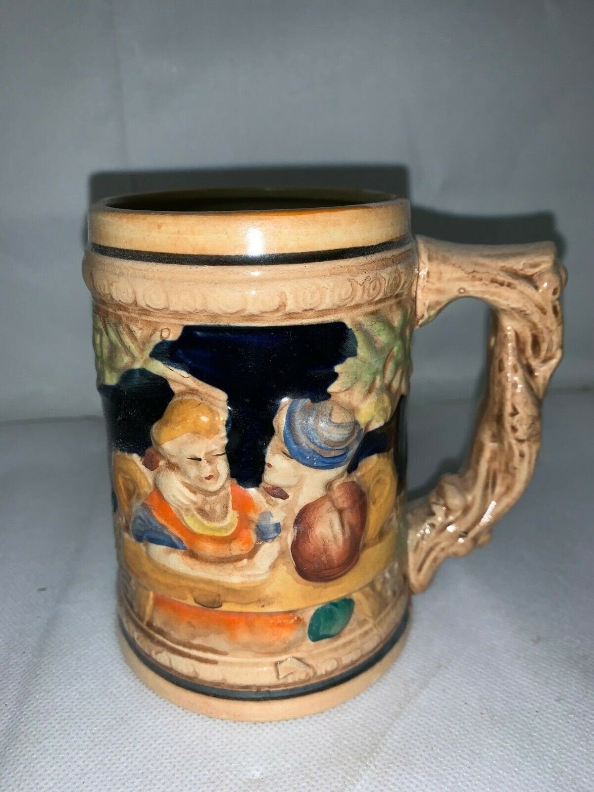 Vintage German Woven Handle Man and Women at Table Unmarked Unlidded Stein