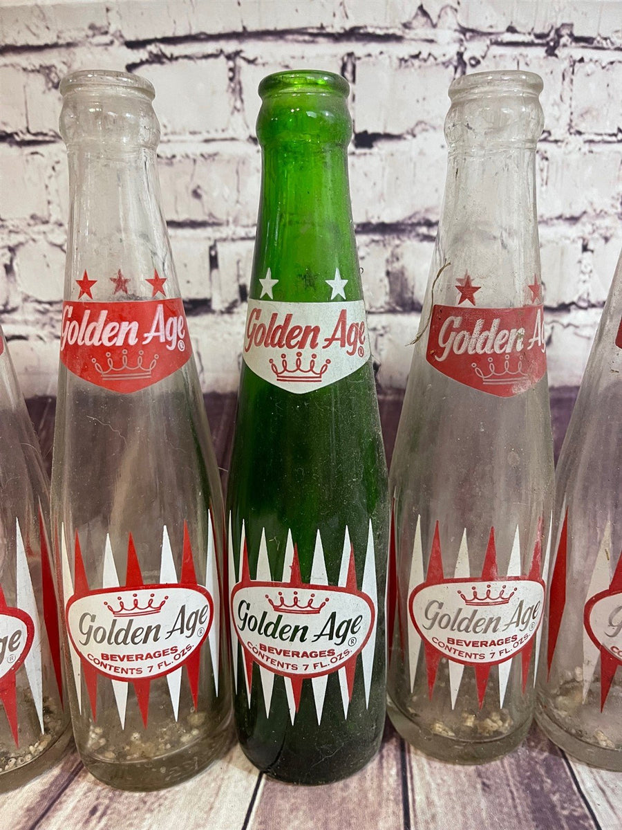 Seven Vintage Advertising Glass Golden Age Mid Century Collectible Bottles