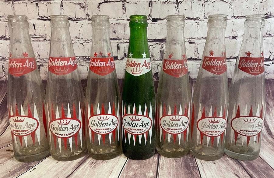 Seven Vintage Advertising Glass Golden Age Mid Century Collectible Bottles