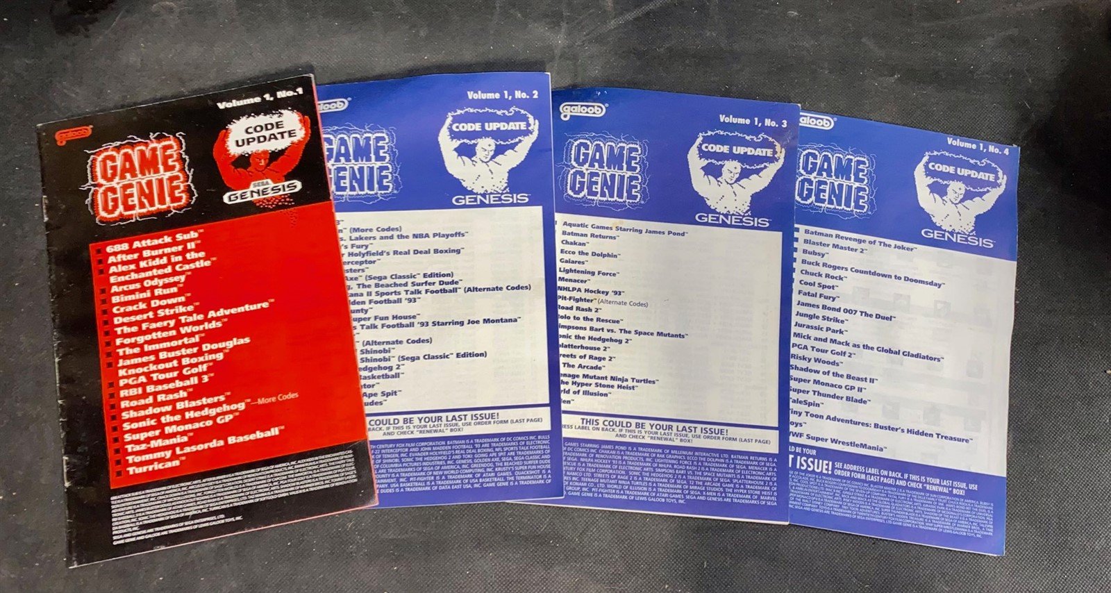 Original Sega Genesis Game Genie w/ 7 Code Updater Manuals